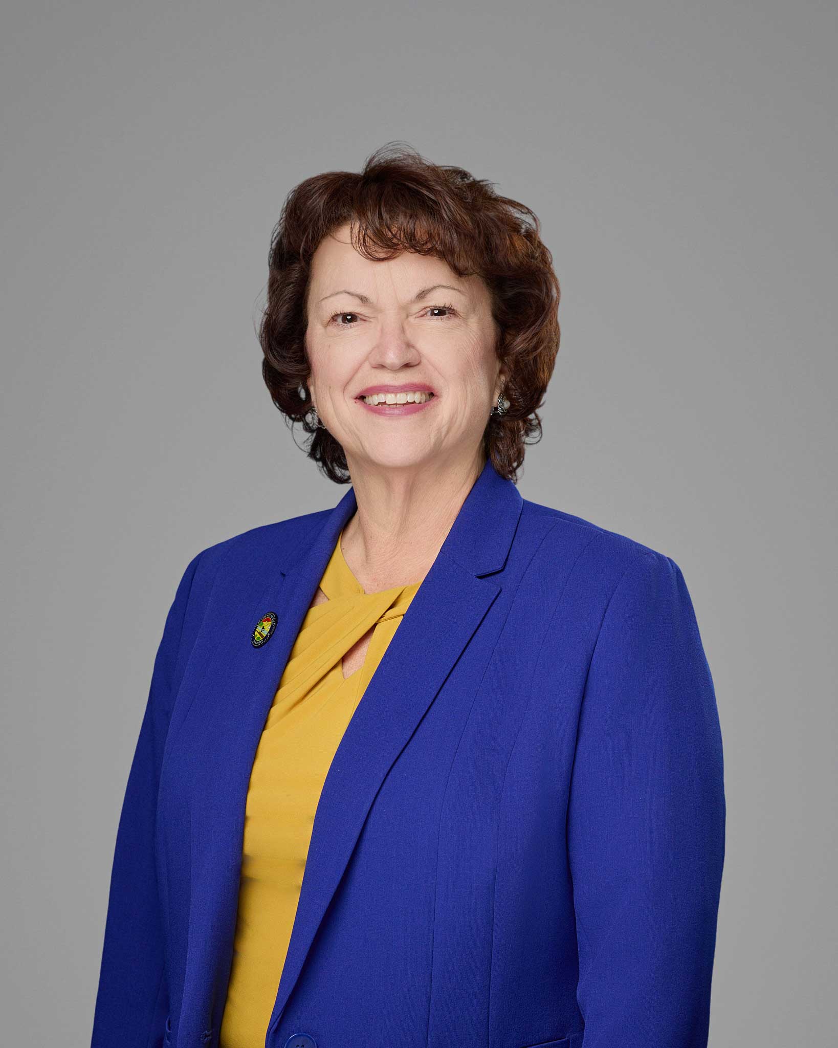 a woman in a blue jacket