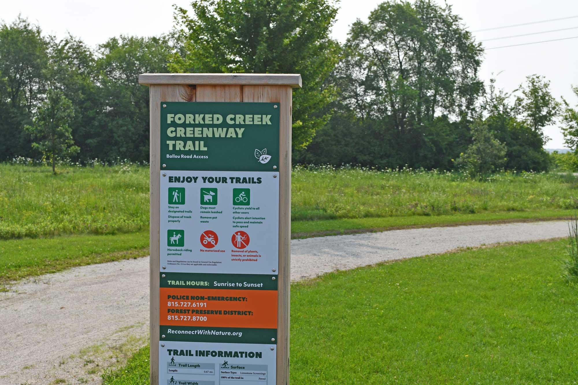 Trail sign along a limestone trail.