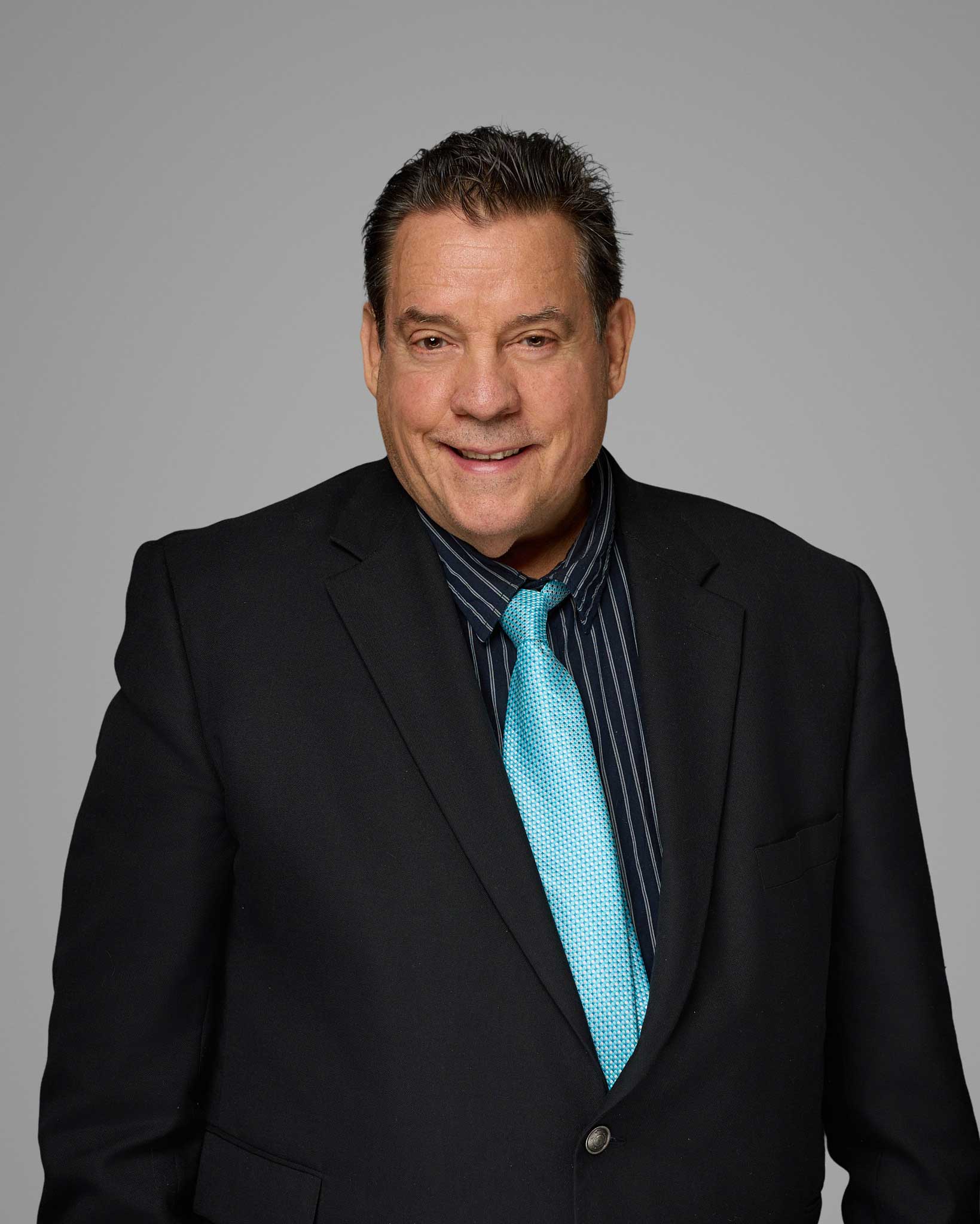 a man in a suit and tie