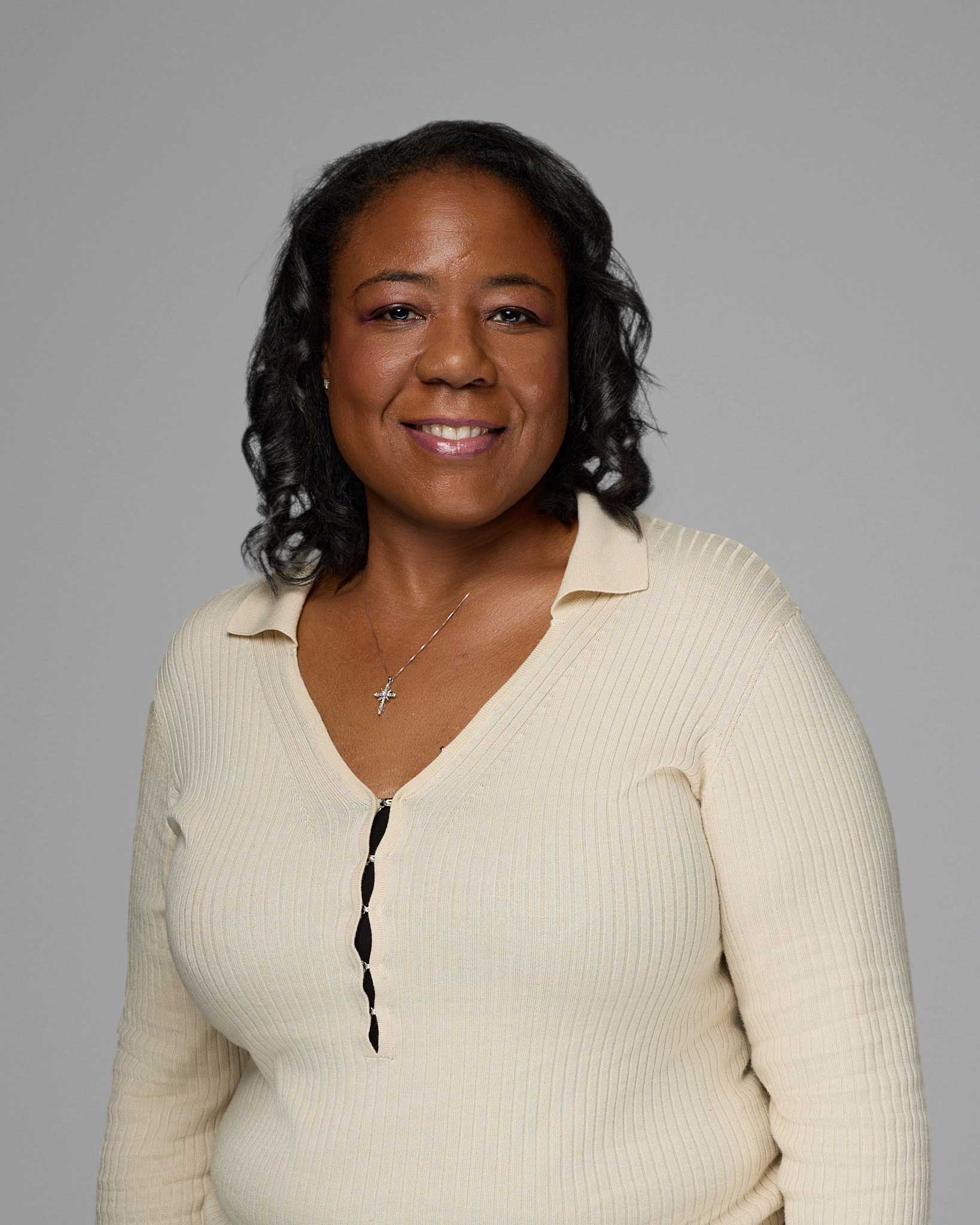 a woman in a white sweater
