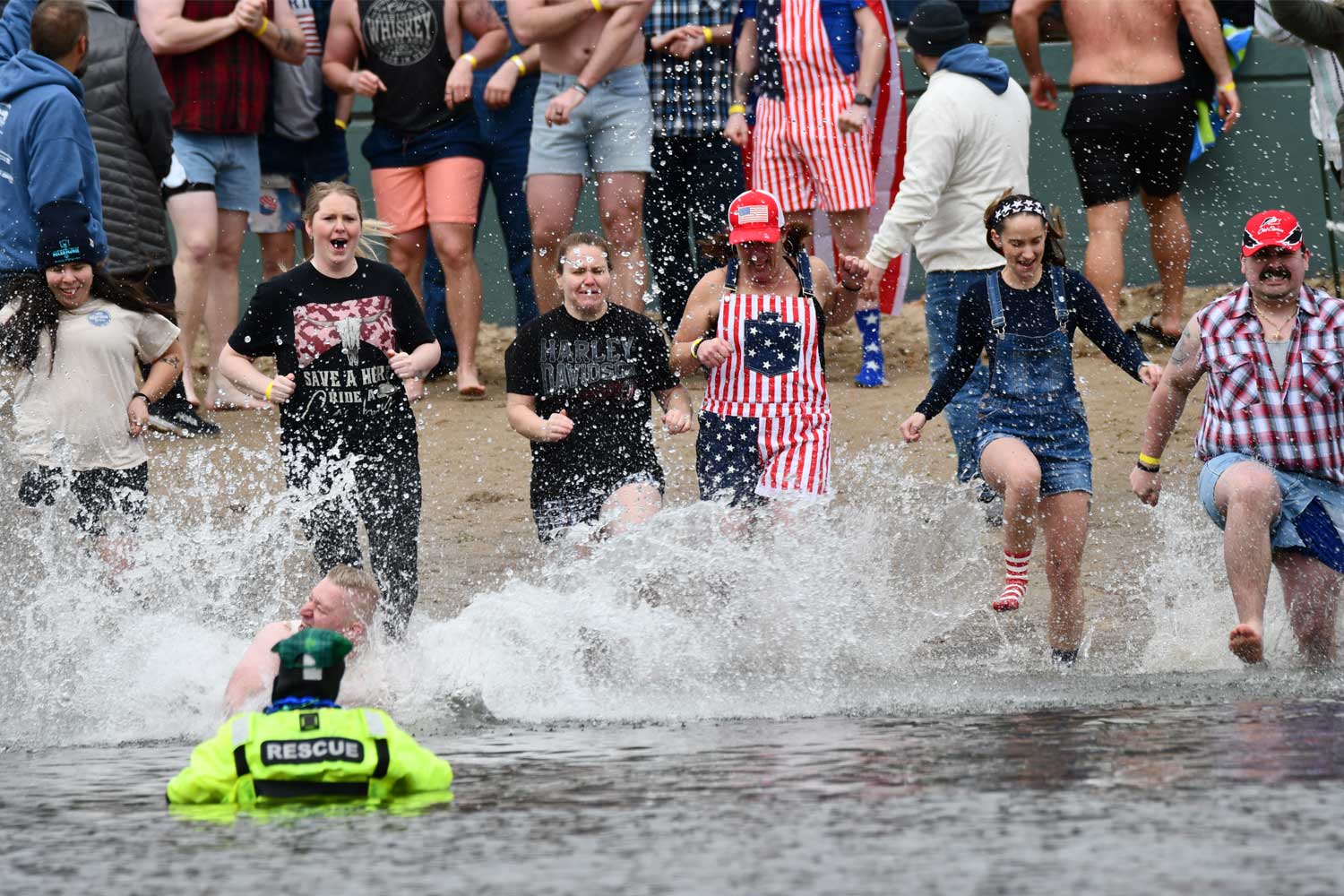People dive into water