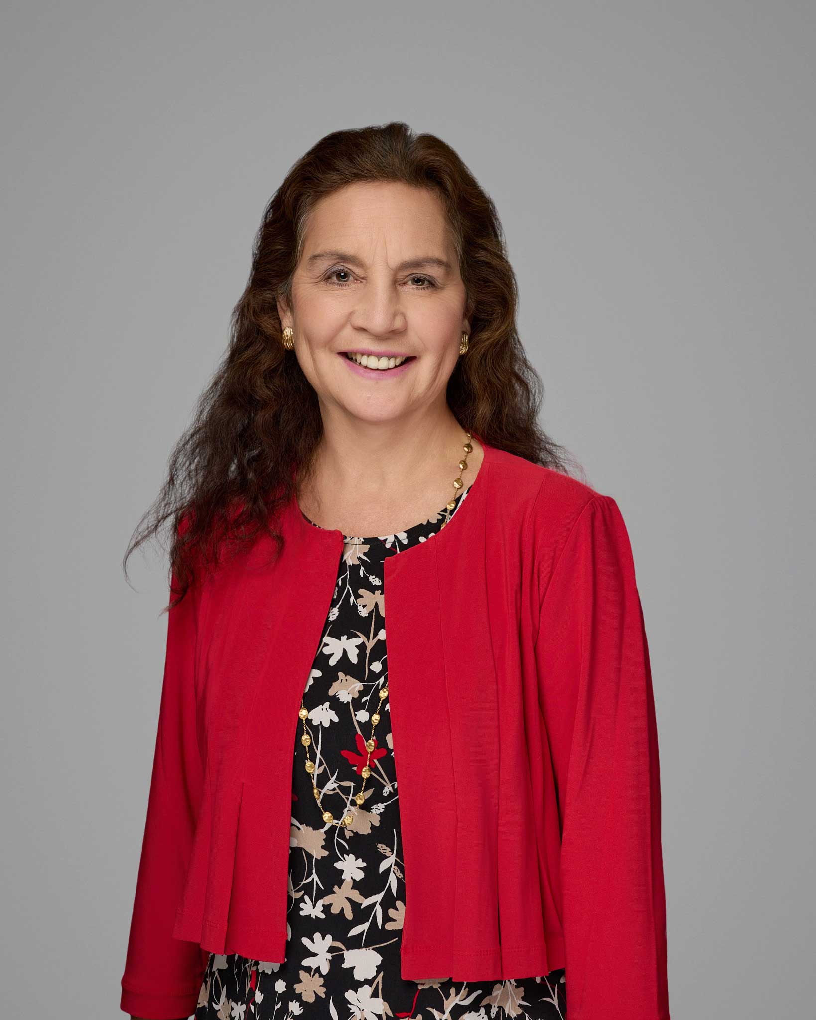 a woman in a red jacket