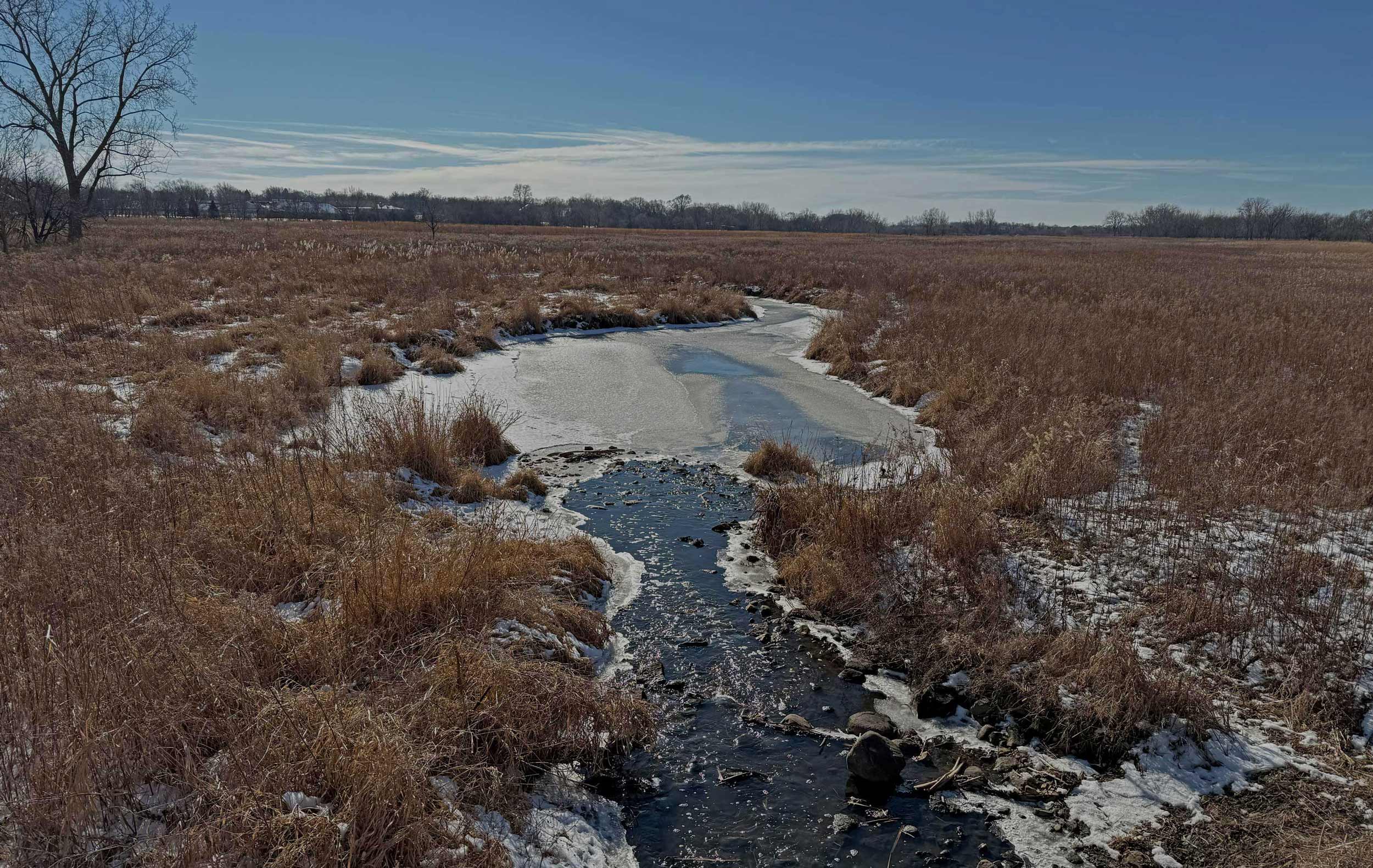A partially frozen creek at Rock Run.