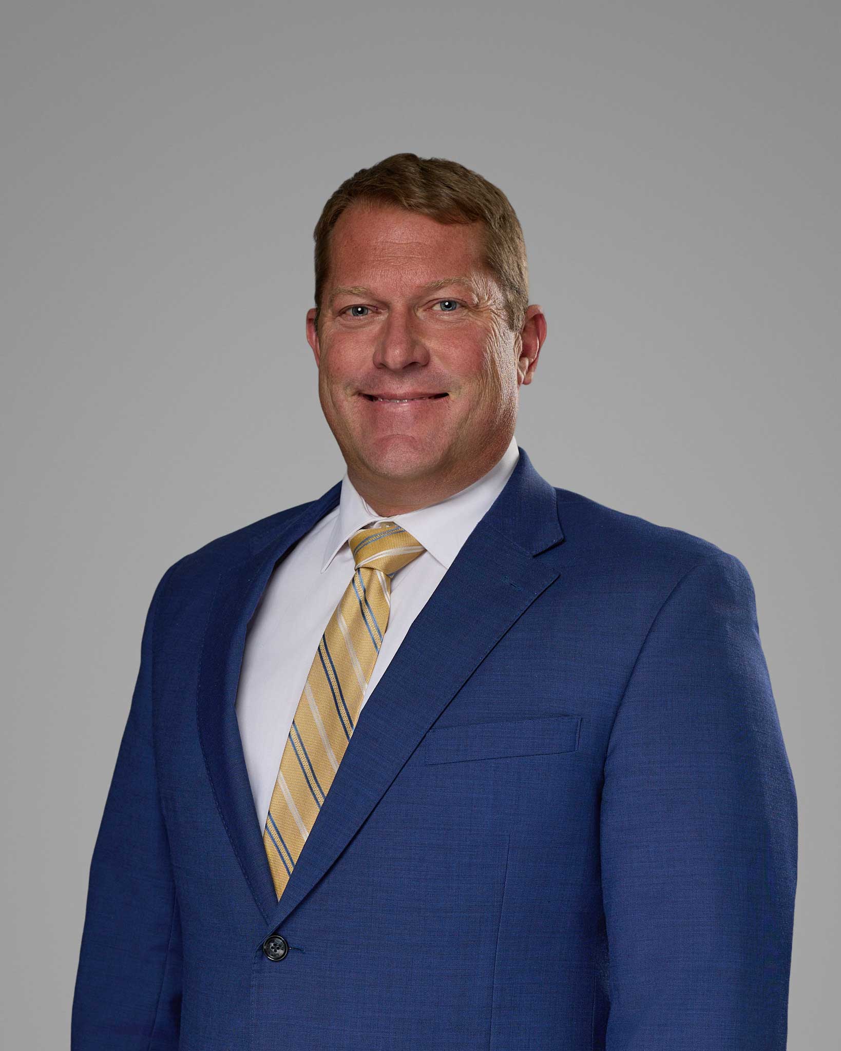 a man in a suit and tie
