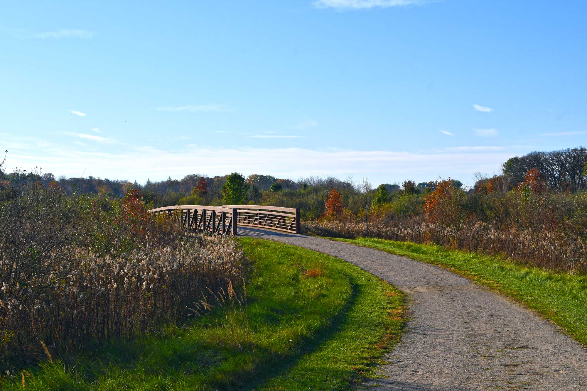Limestone trail leading up to a bridge.