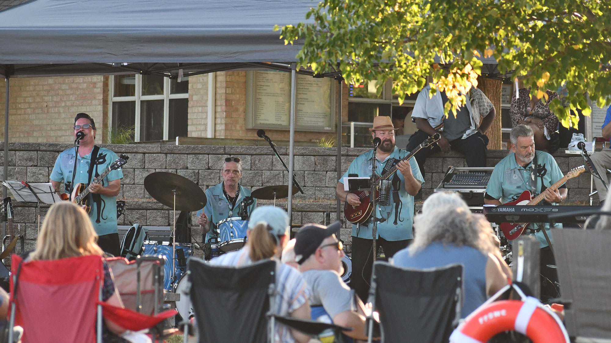 a group of people playing instruments