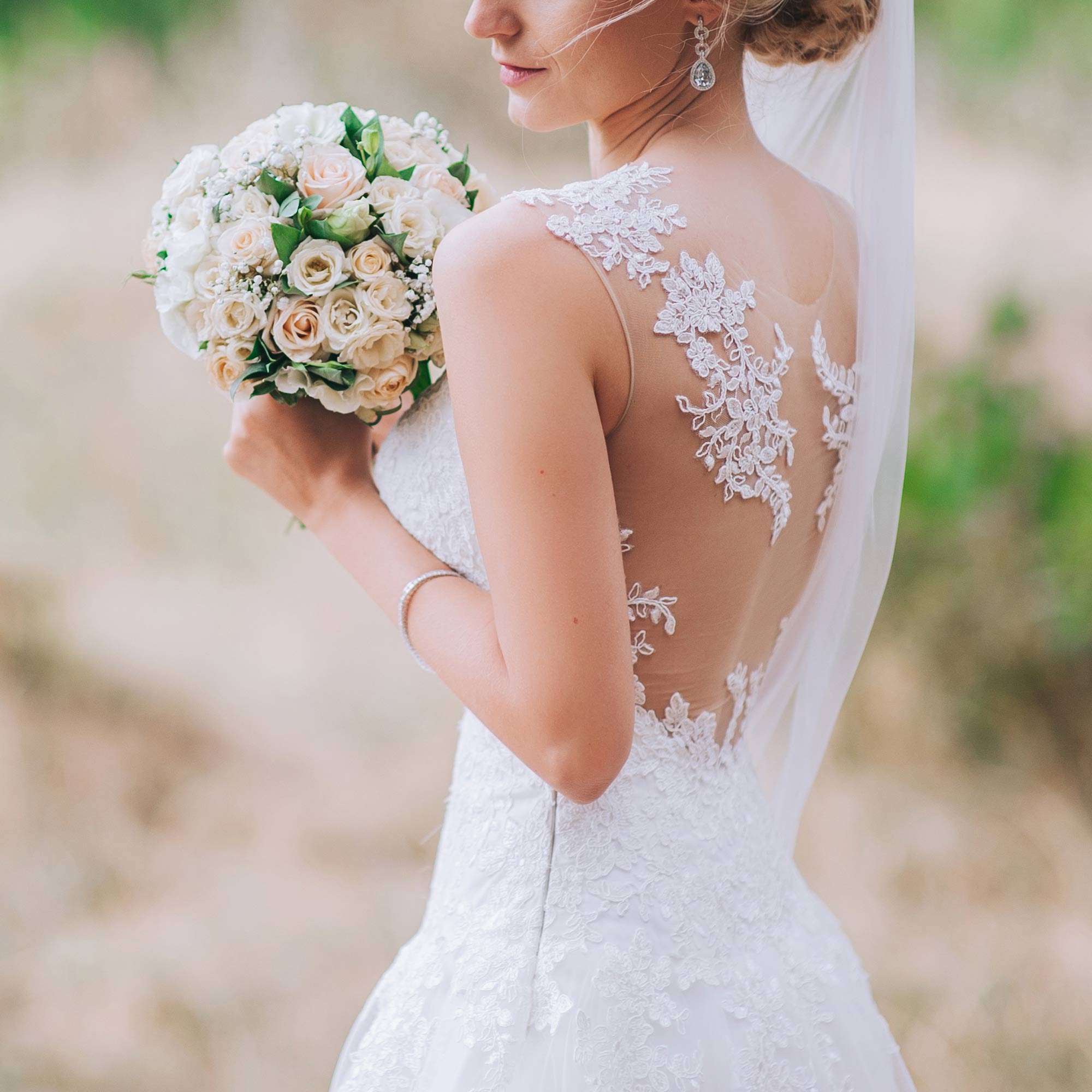 Detail of person at wedding venue in a dress