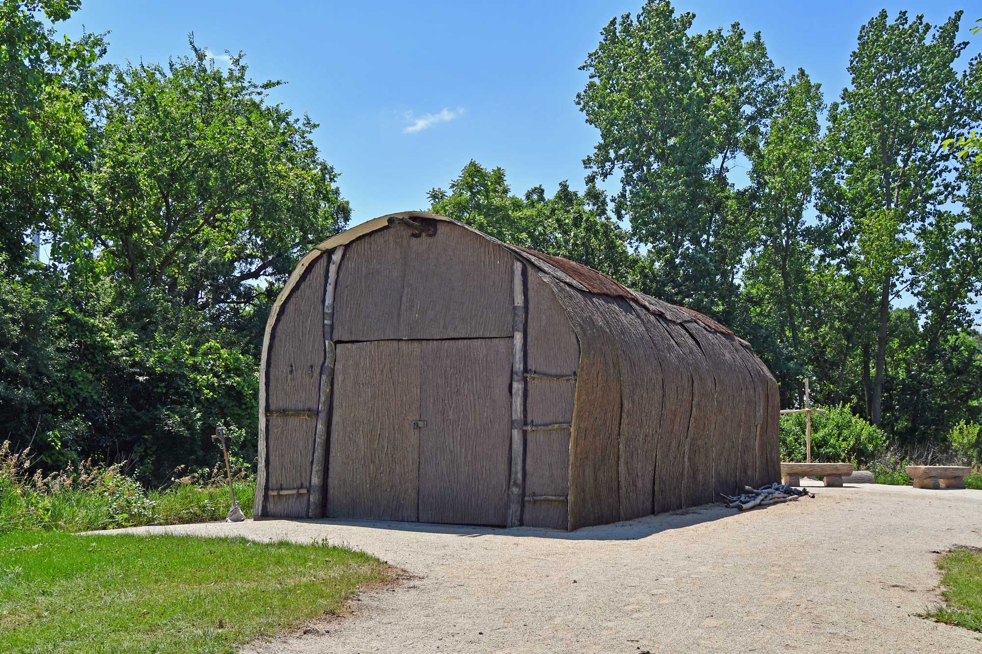 Exterior of a Native American longhouse.