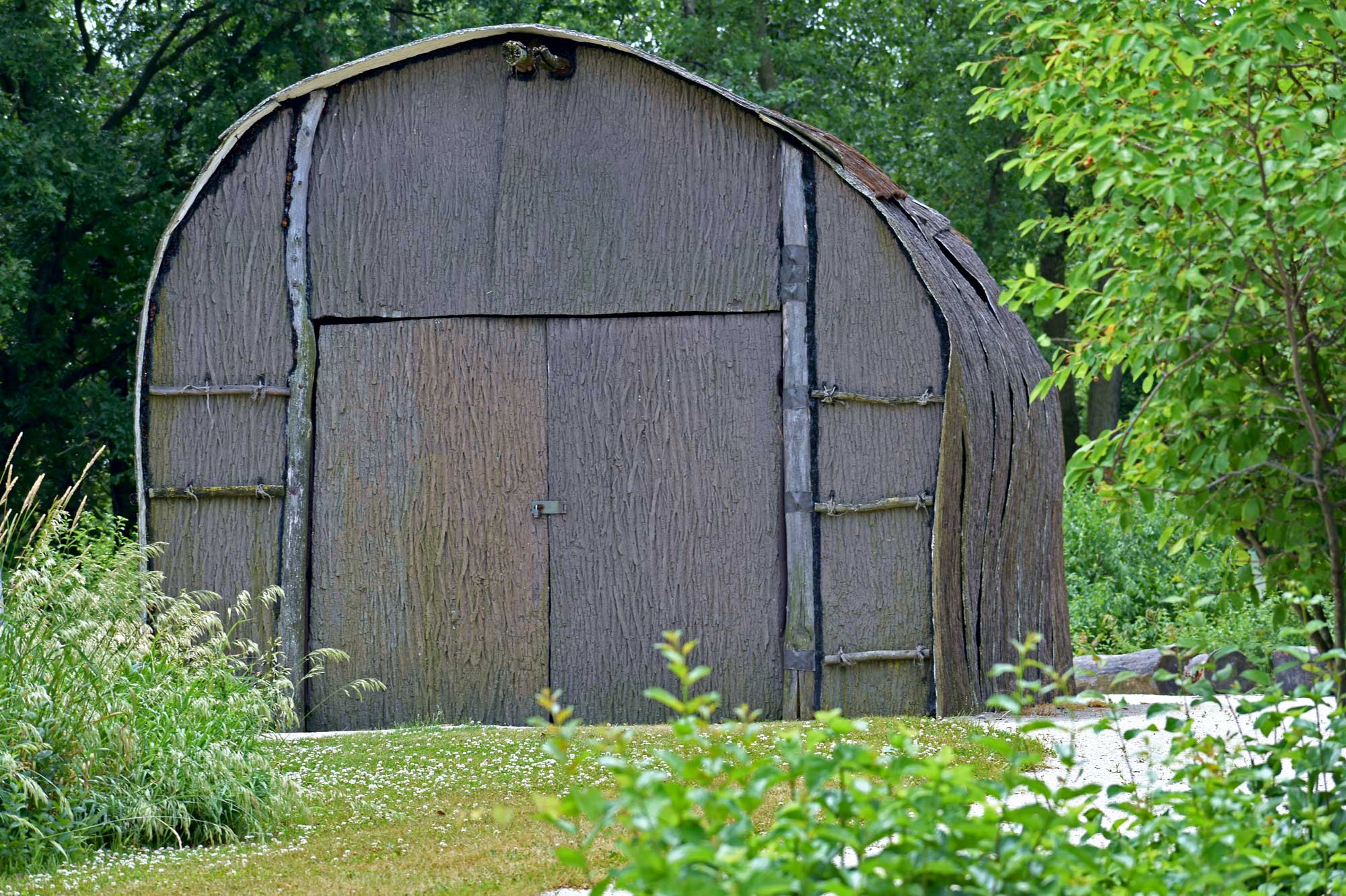 The exterior of a Native American longhouse.