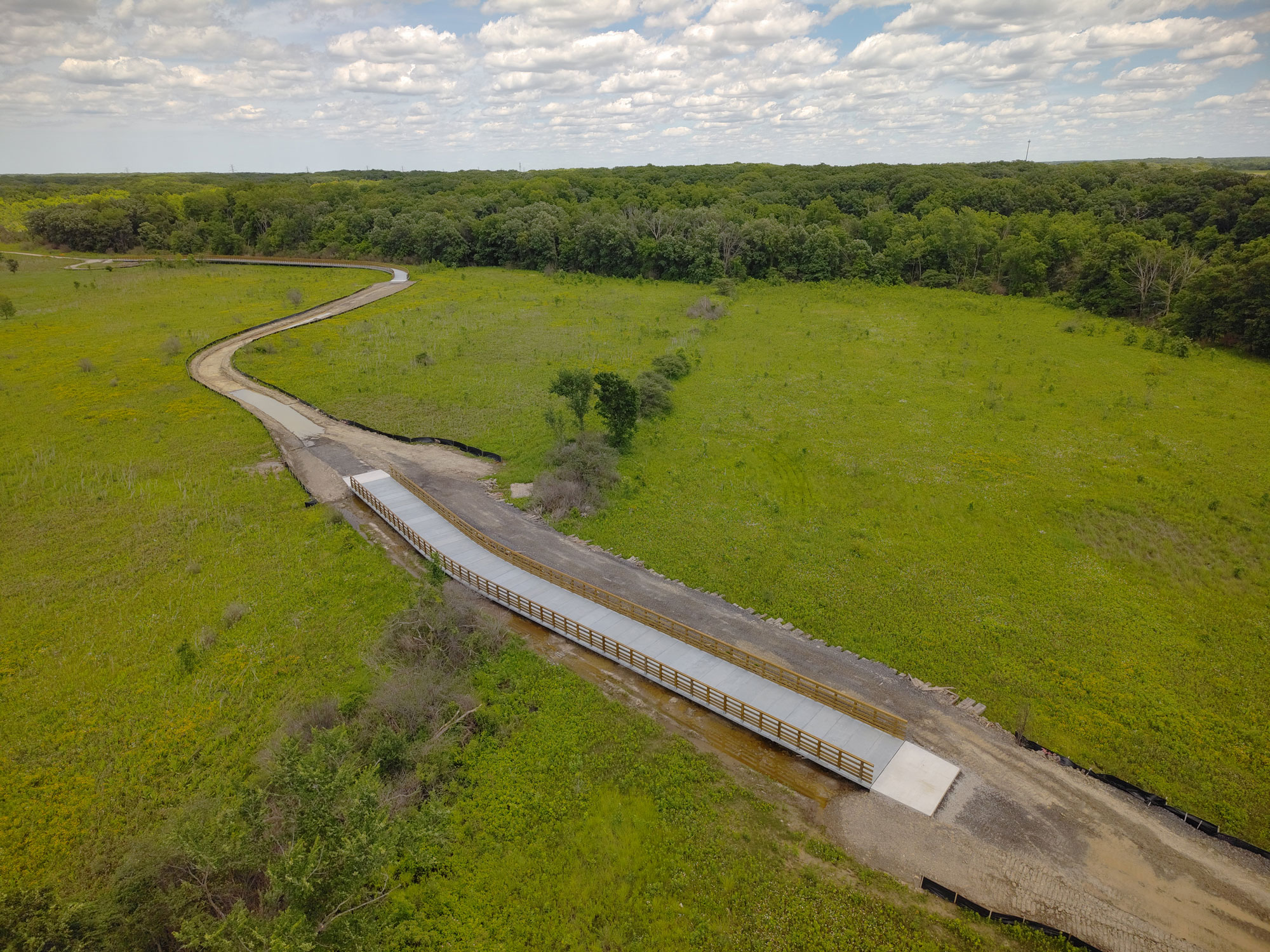 Aerial view of newly installed walking bridge.