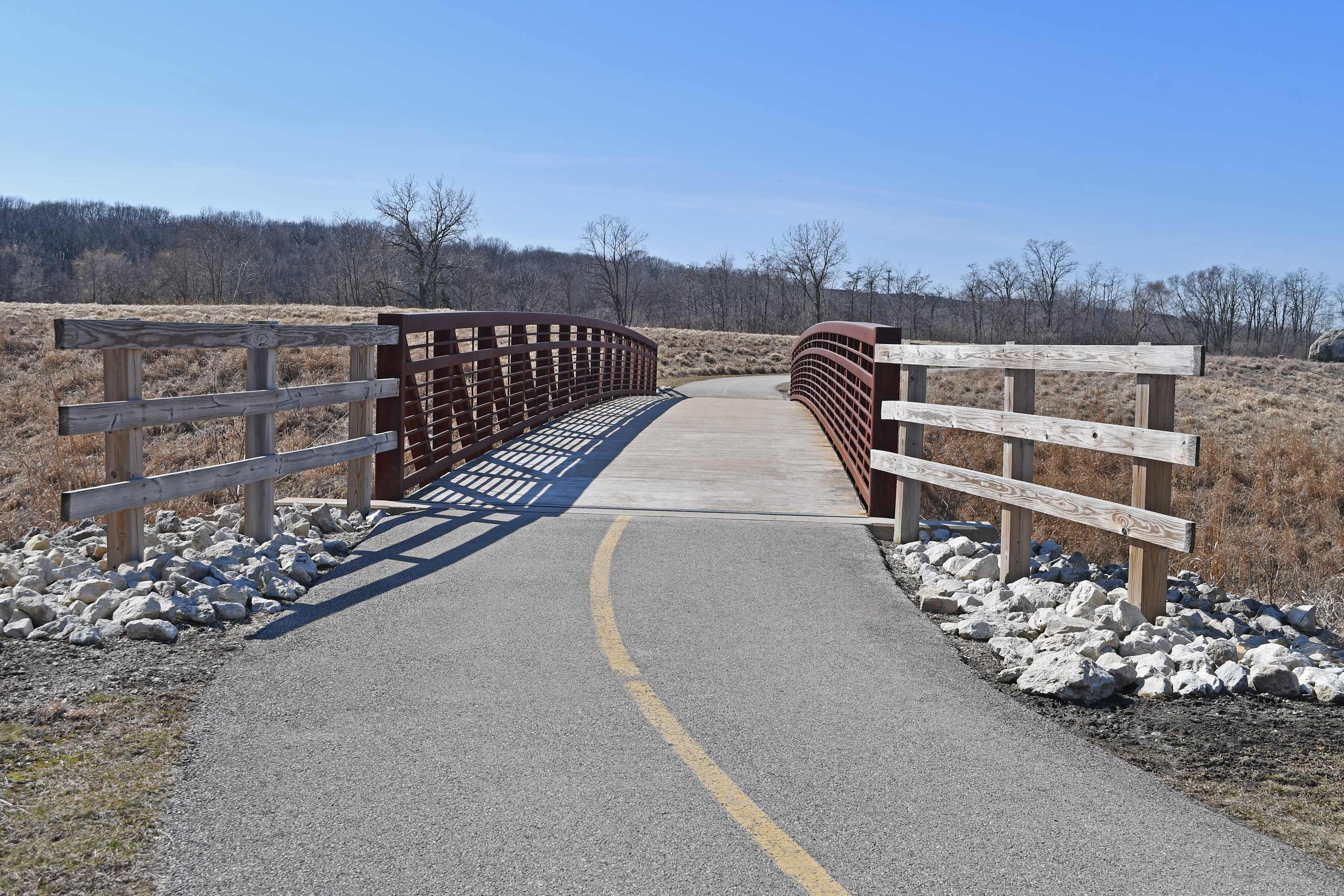A view of a trail and bridge.