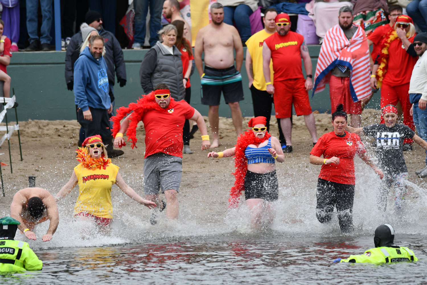 People dive into water