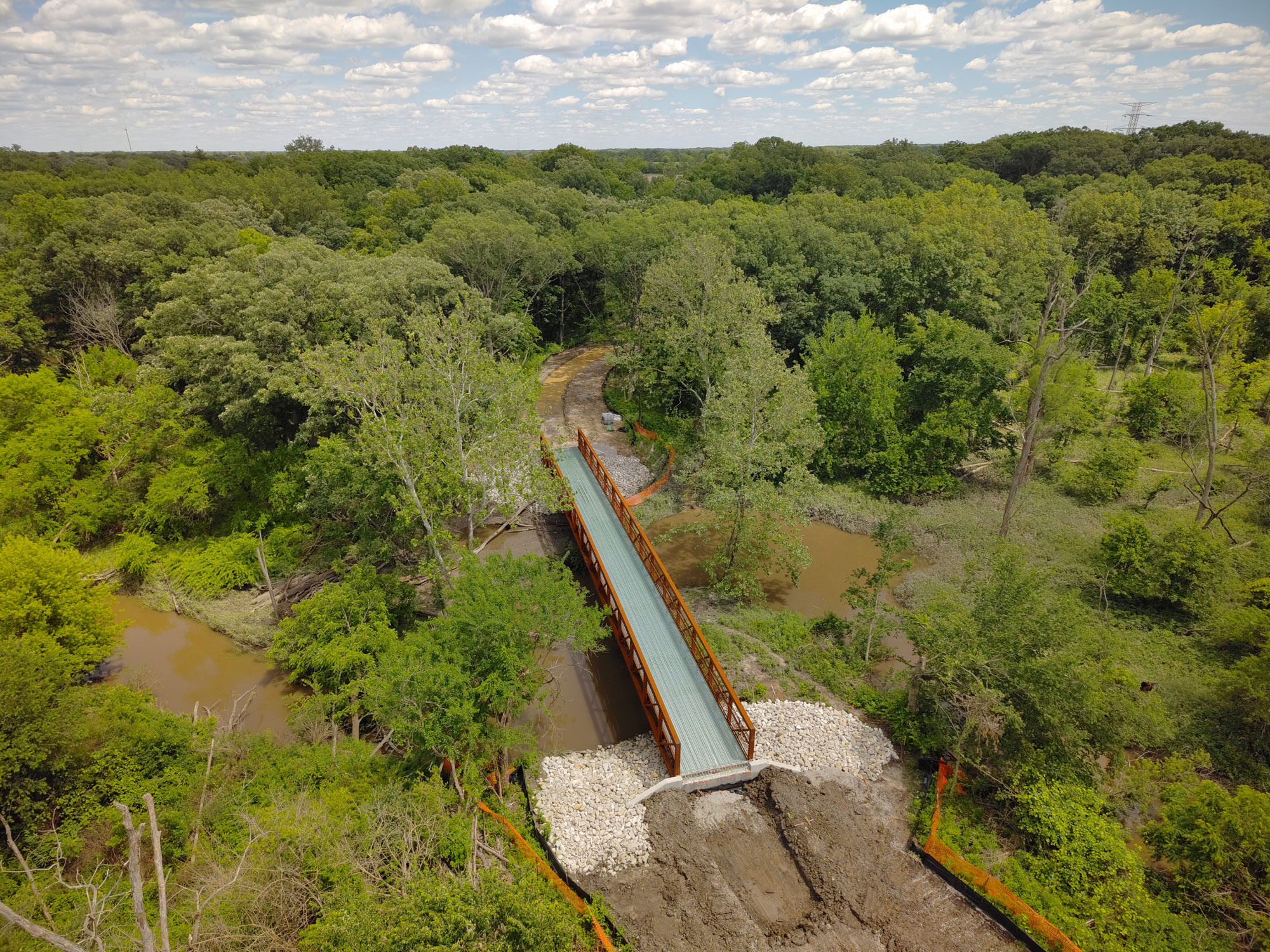 Aerial view of newly installed walking bridge.