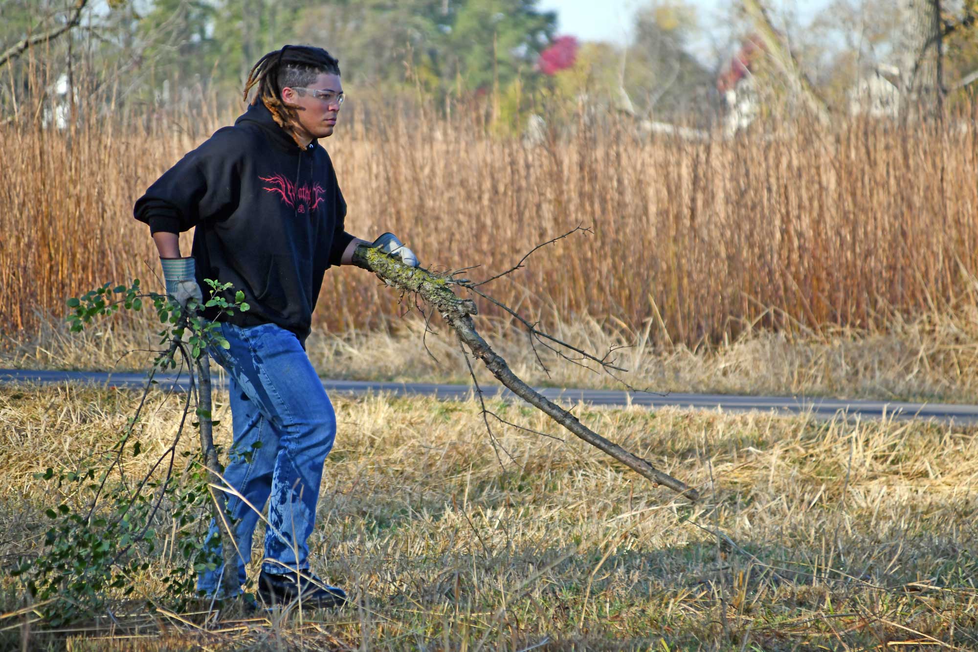 Person doing habitat management work in a preseve.