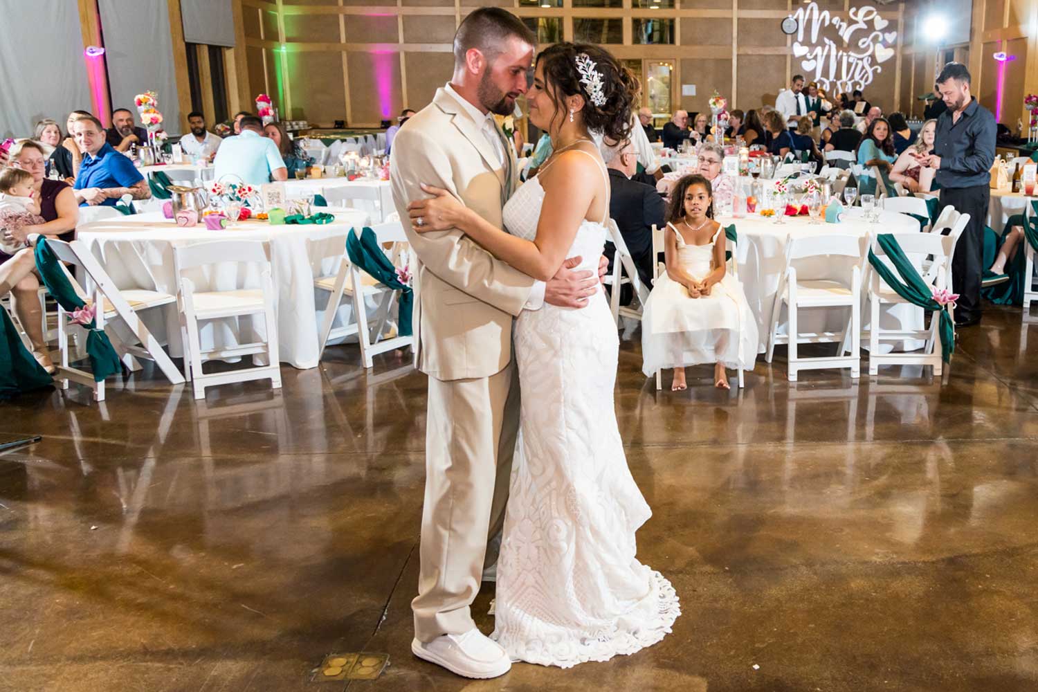 Newly married couple dancing on the dance floor.