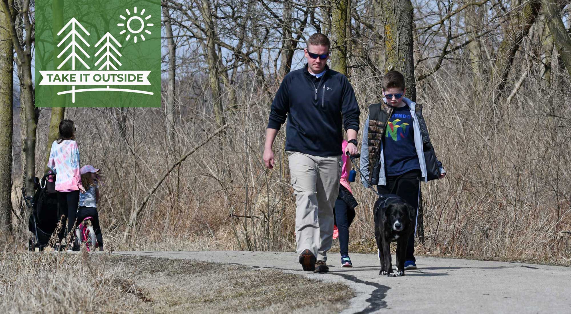 People walking on the trail on a warm winter day