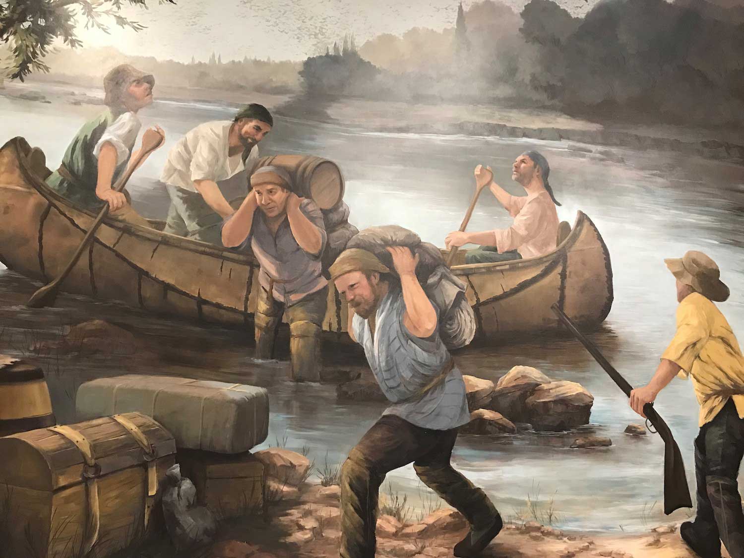 A mural depicting life in the fur-trade era.