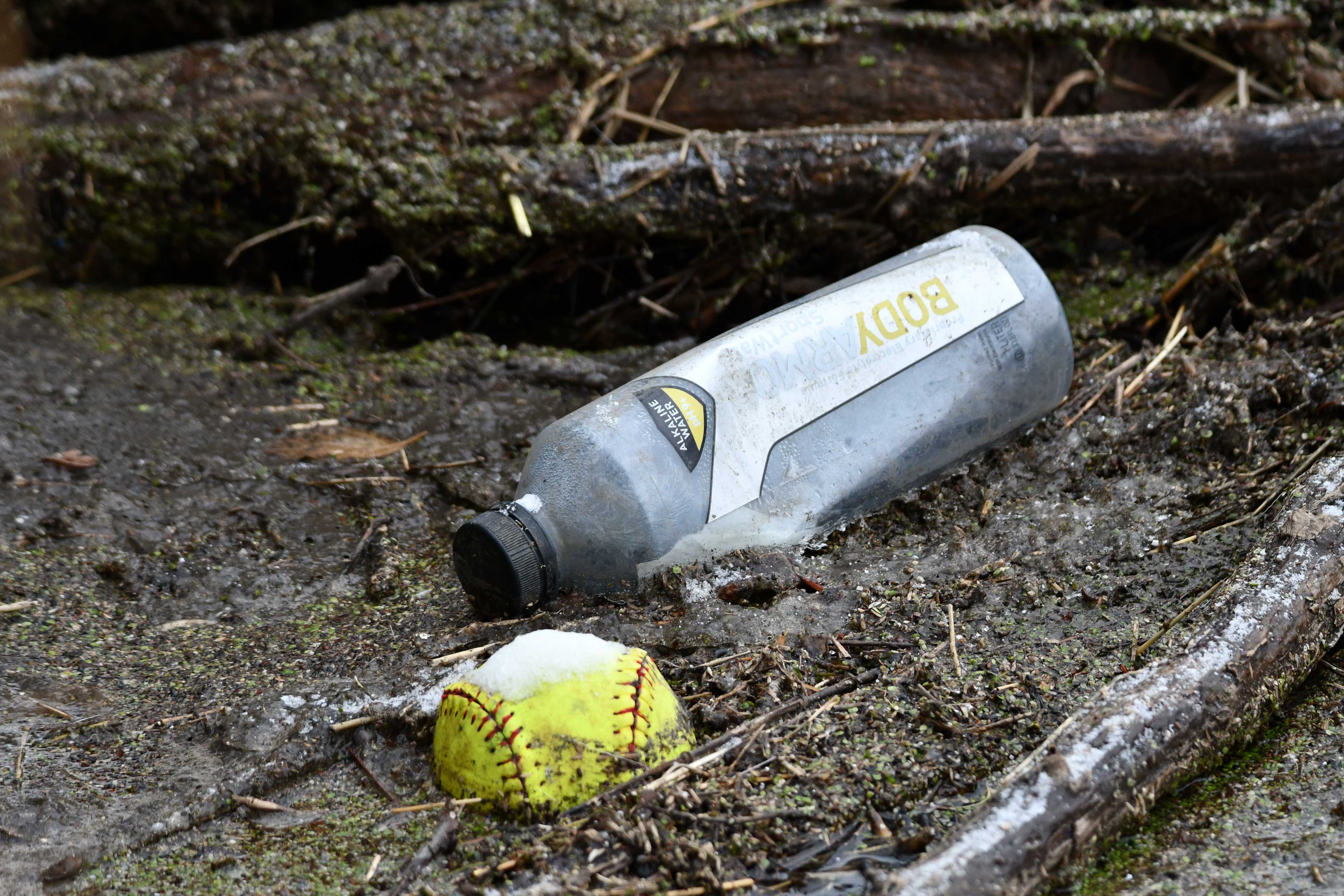 A plastic bottle on the ground.