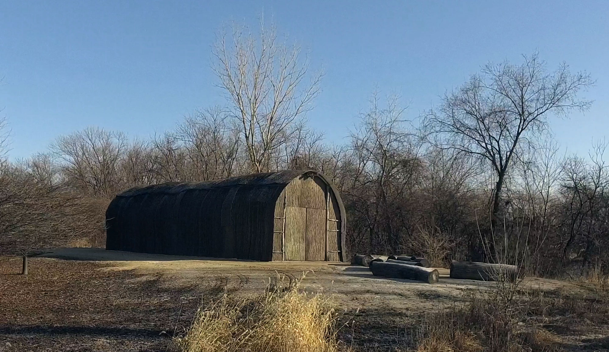 The exterior of a Native American longhouse.