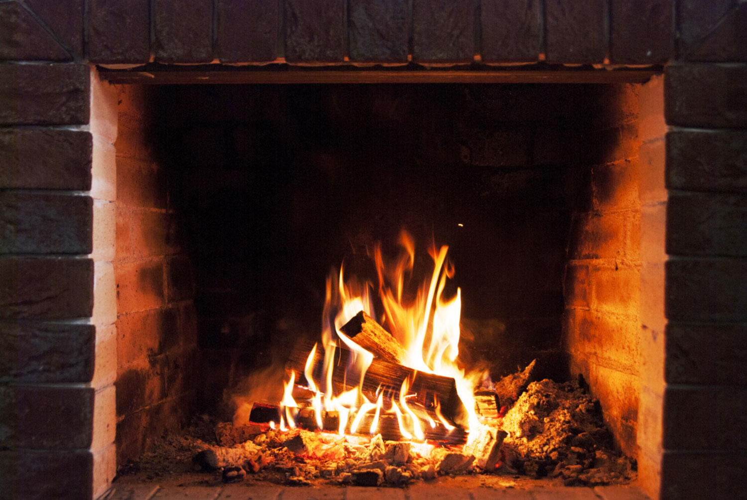 A fire burning in a fireplace.