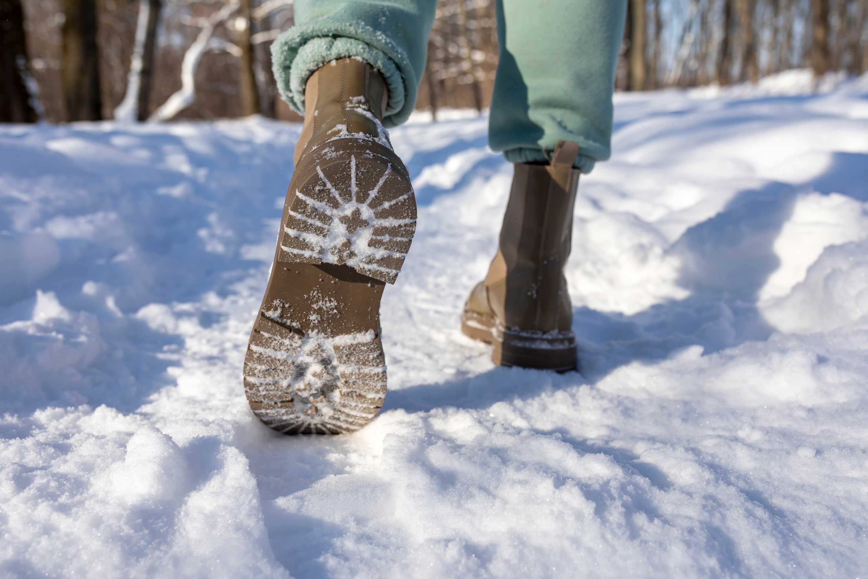 A detail shot of boots in snow.