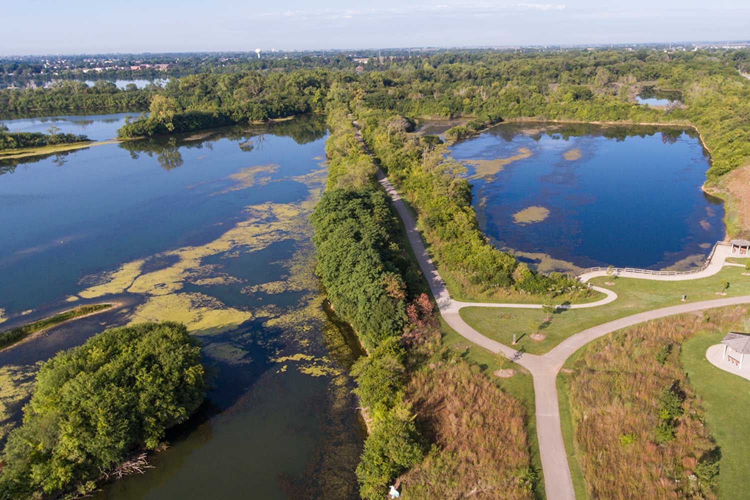 An aerial view of Lake Renwick, showing the trails and surrounding water.