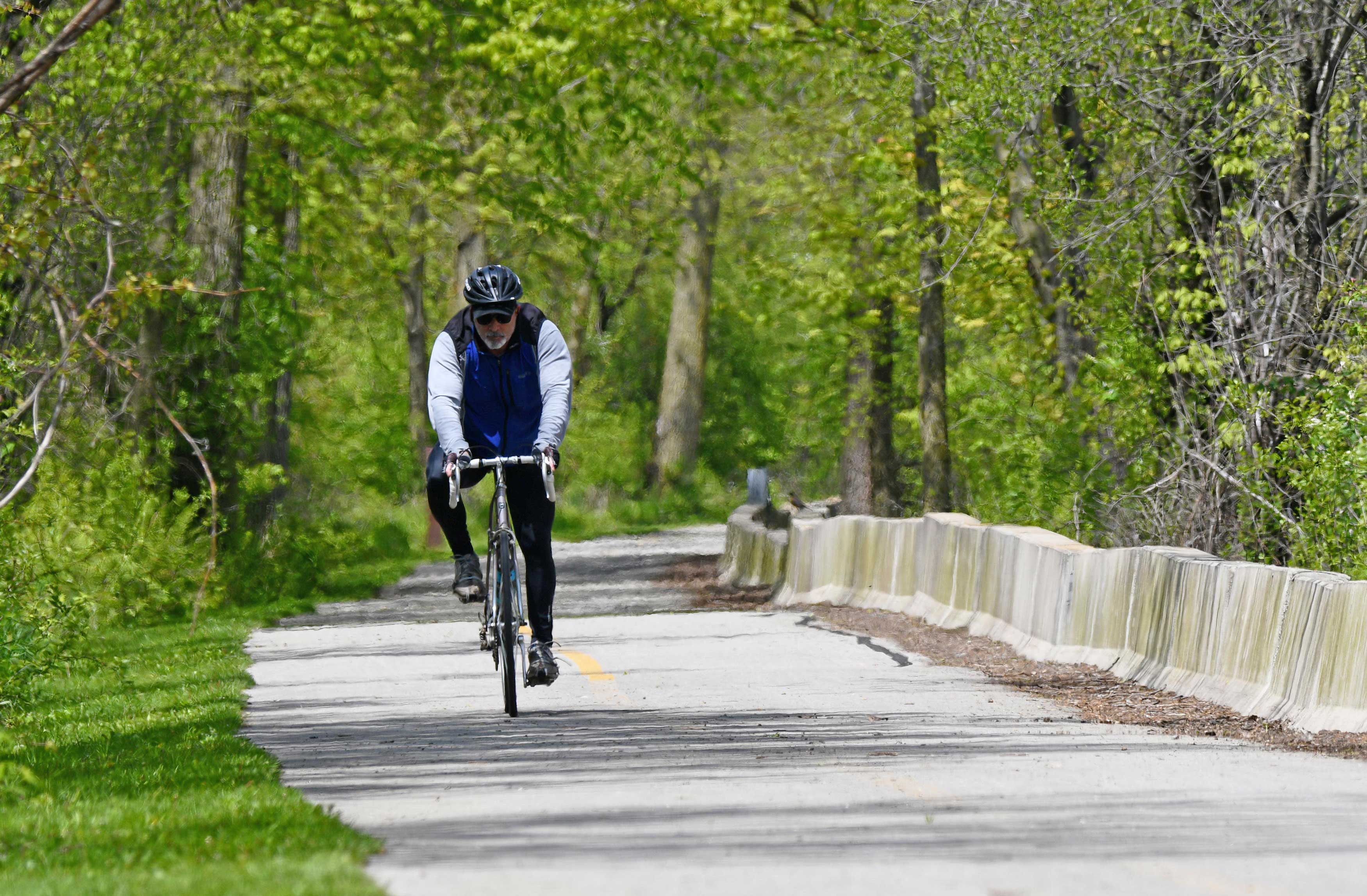 A bicyclist on a trail.