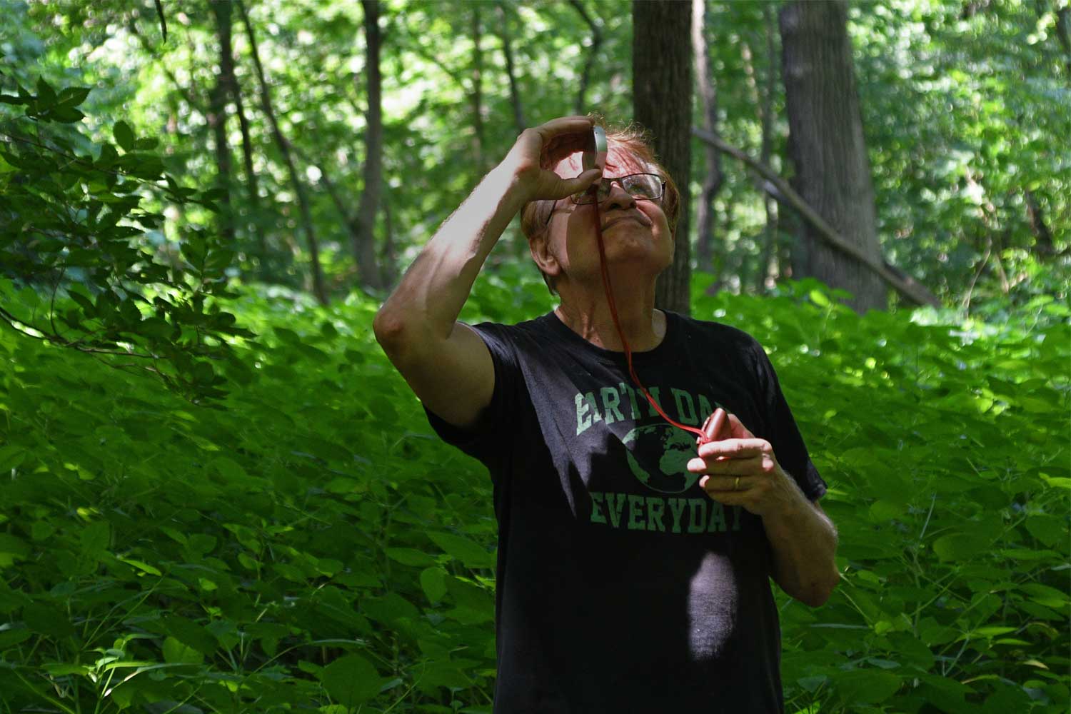 Dave Shepard observing trees.