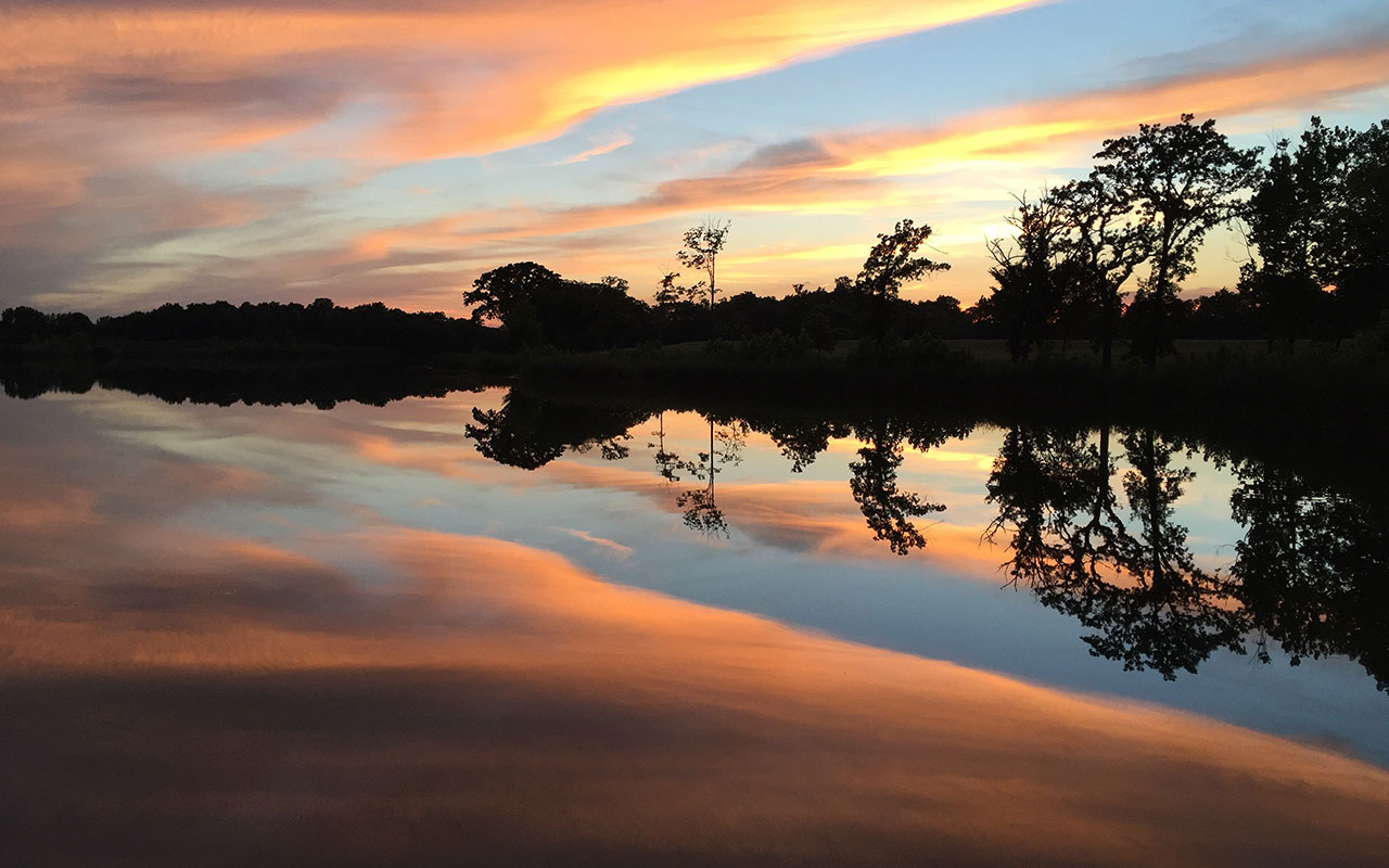 A sunset at Lake Chaminwood.