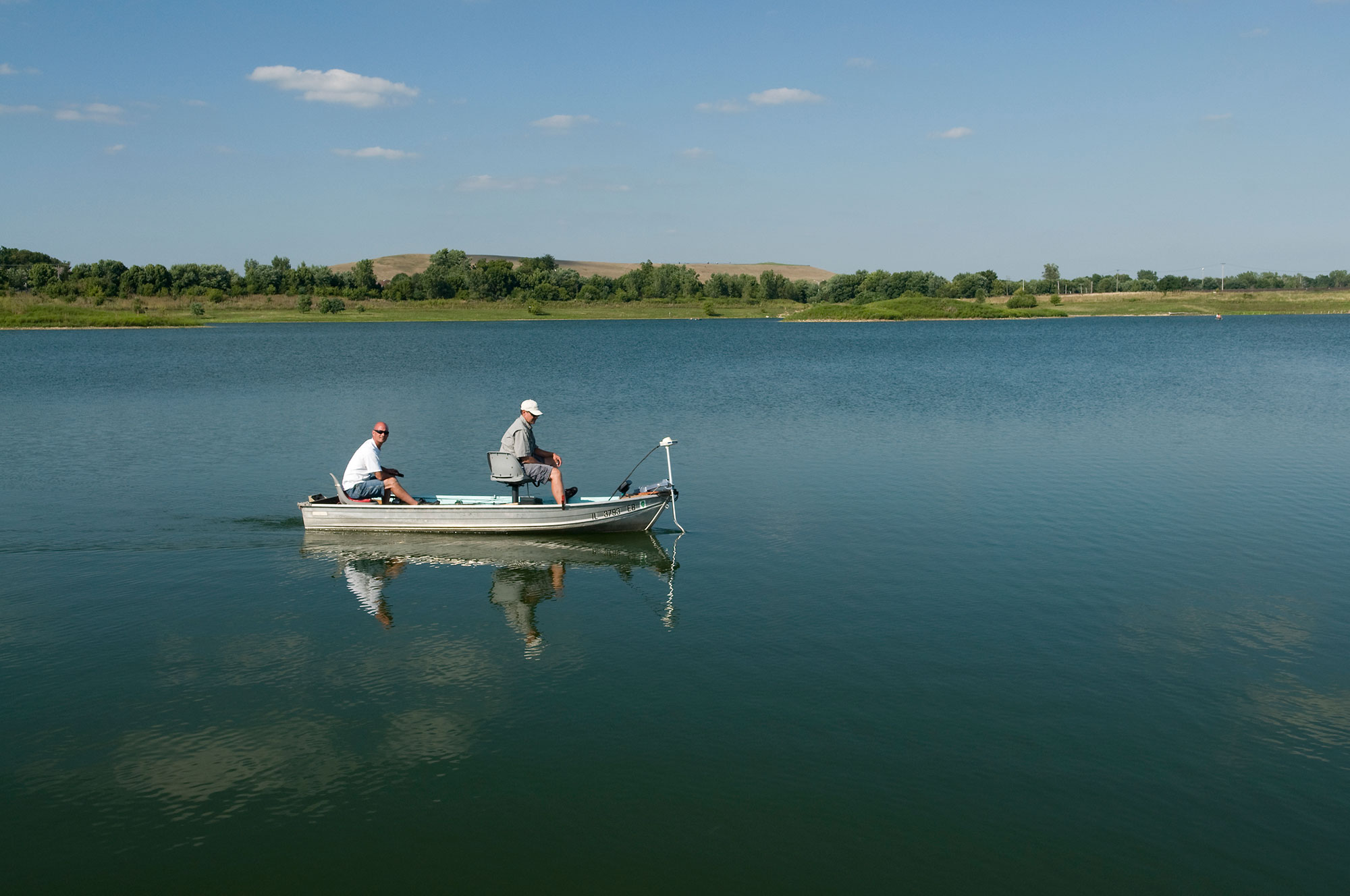 A boat in the water at Whalon Lake.