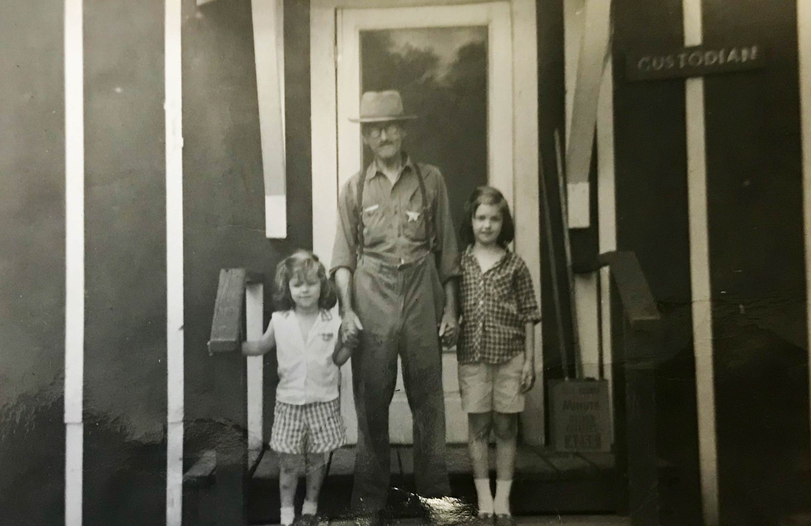 Arthur Sage with his daughters.