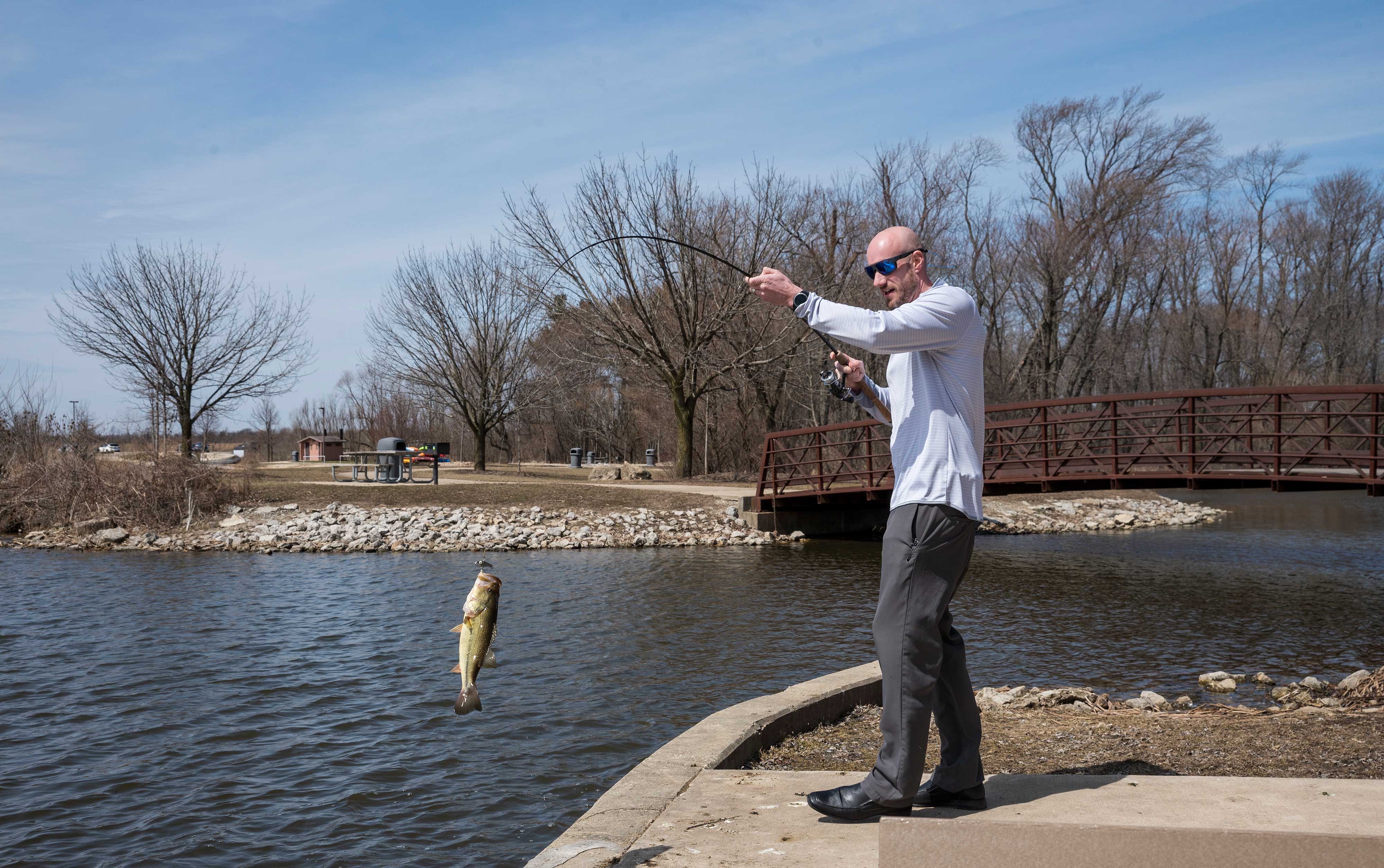 A preserve visitor fishing at Monee Reservoir.