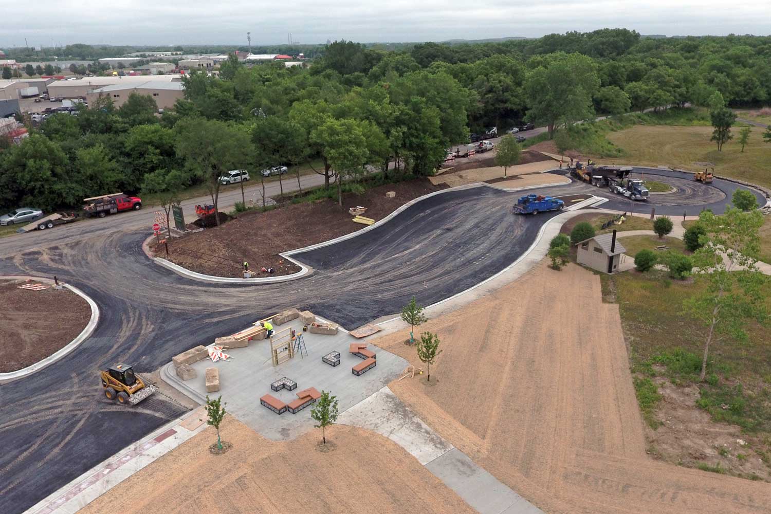 Aerial view of newly paved parking lot.