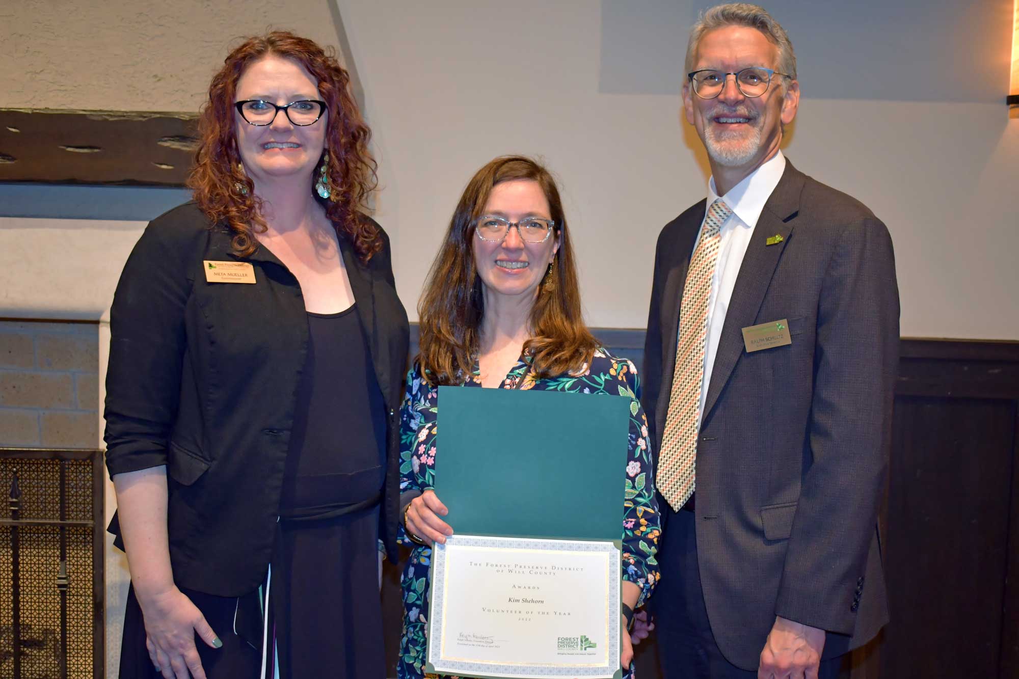 From left: Forest Preserve Board President Meta Mueller, volunteer Kim Shehorn, and Forest Preserve Executive Director Ralph Schultz.