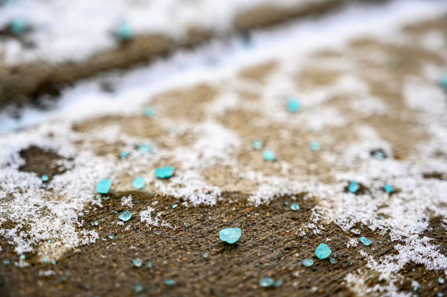 De-icing salt on a sidewalk.