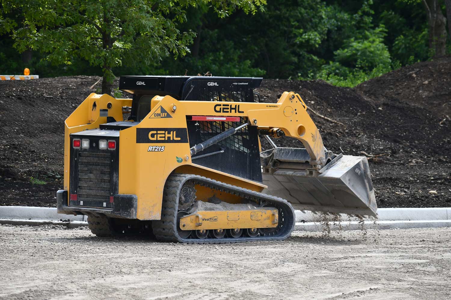 Construction vehicle dumping materials.