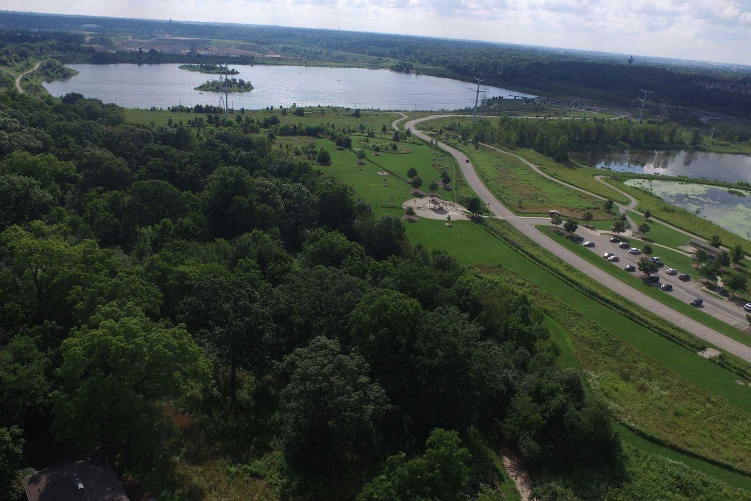 A summertime aerial view with Whalon Lake seen in the distance.