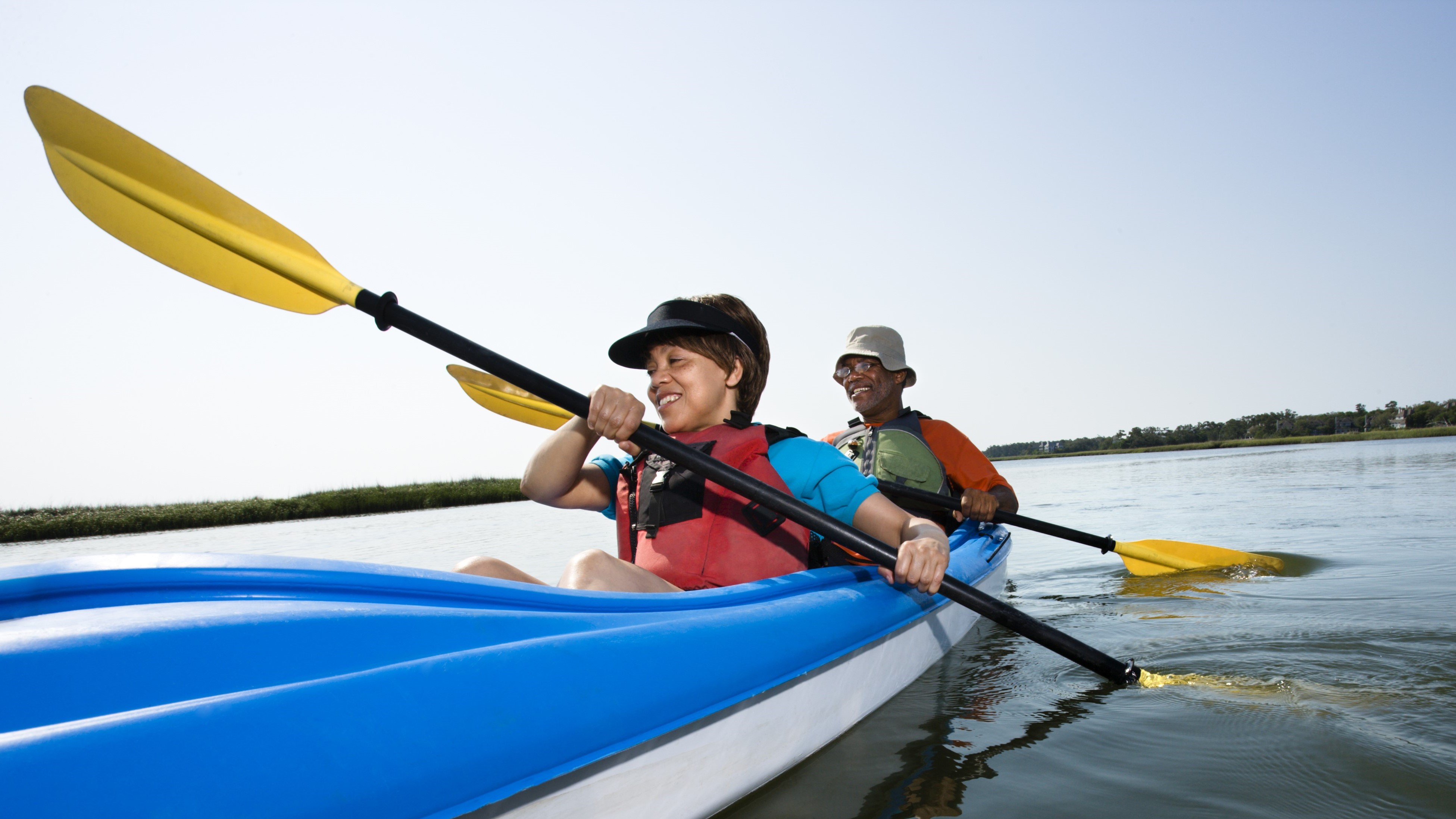 Two kayakers in a tandem kayak.