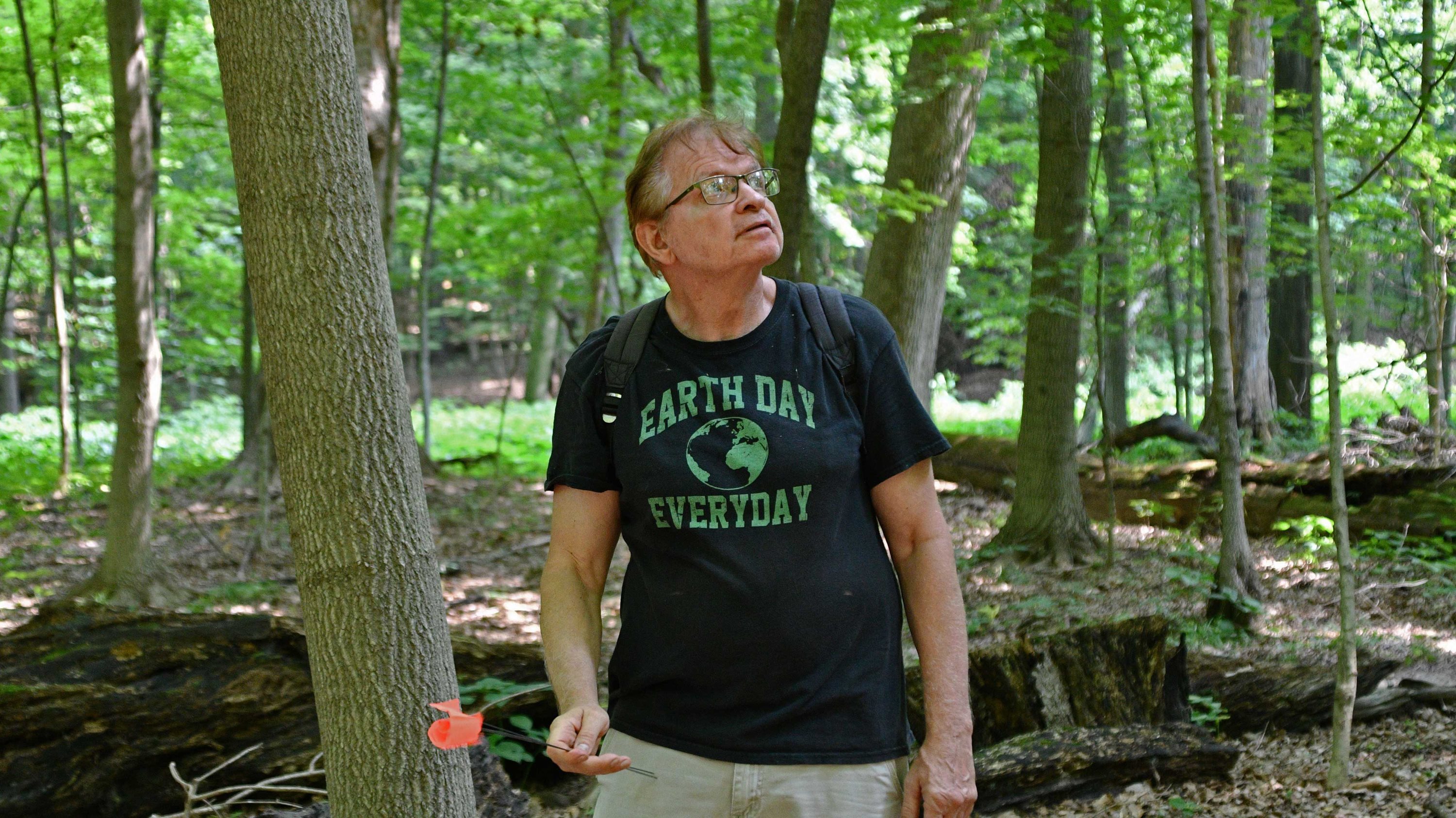 Dave Shepard walking the trail at Messenger Woods.