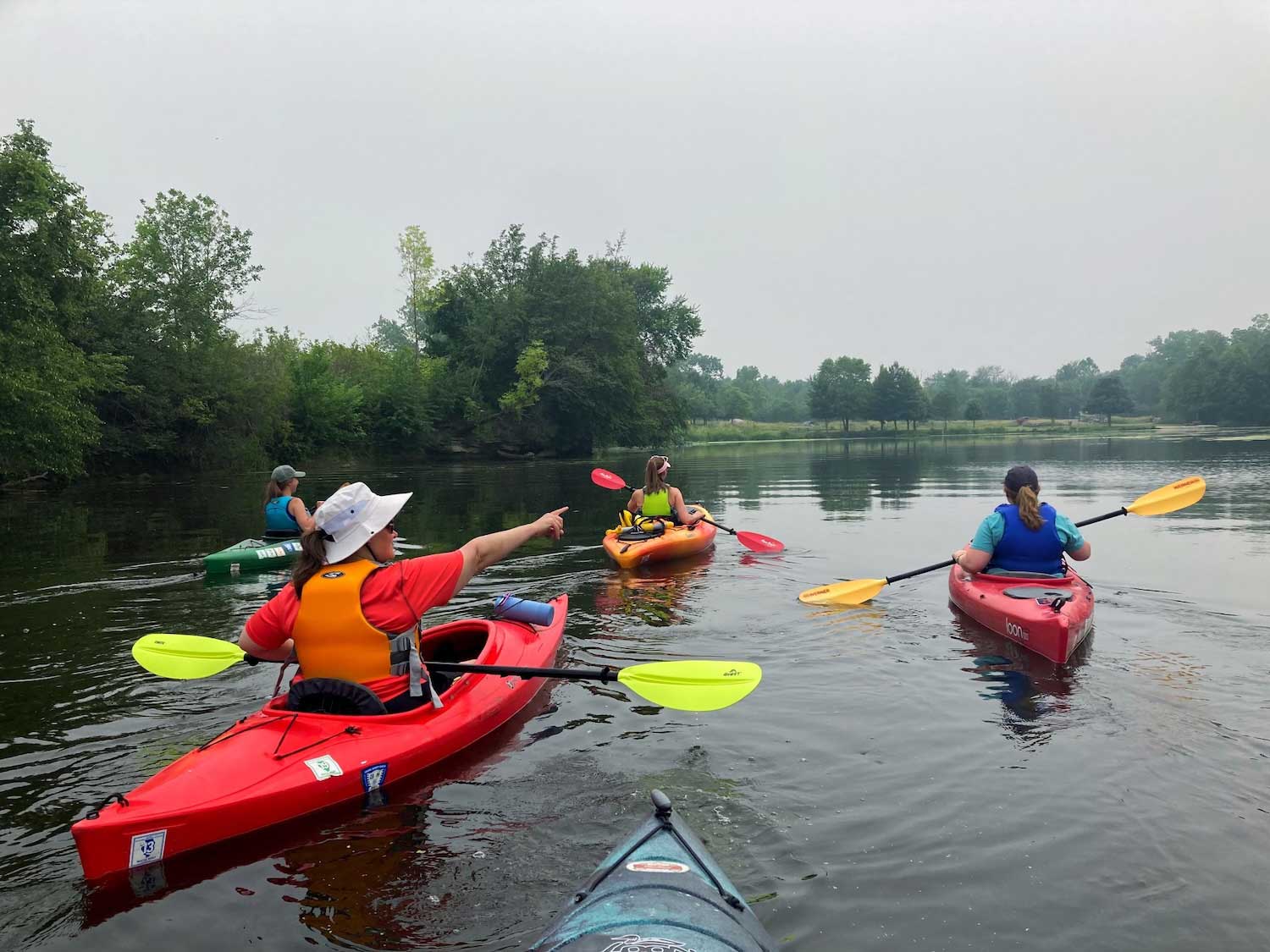 A group of people kayaking.